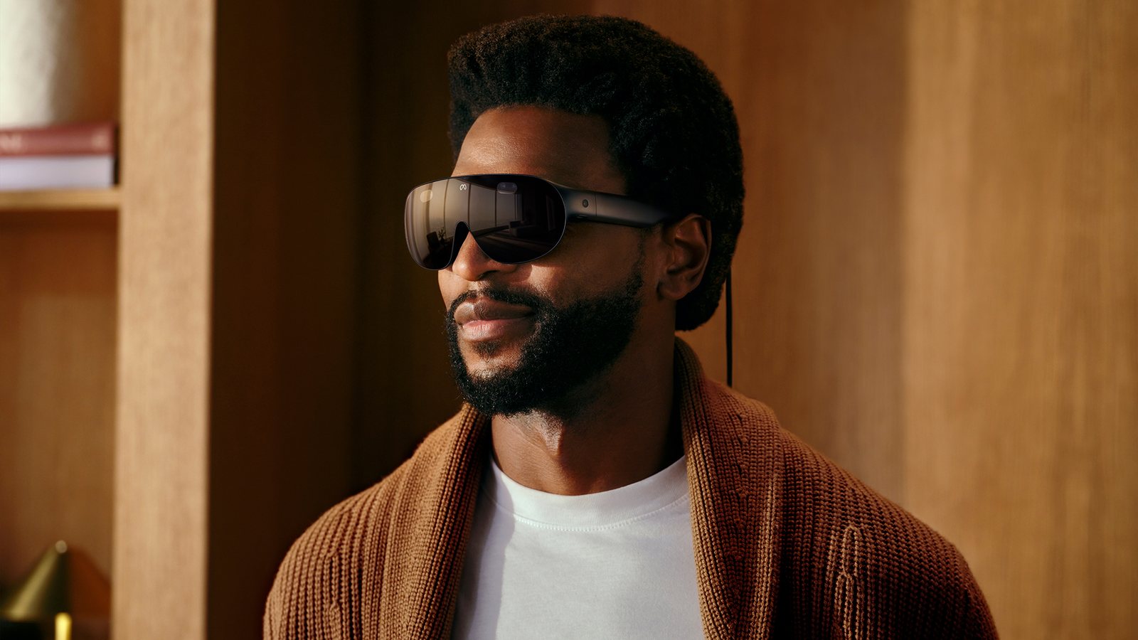 A man wearing Meta VR Glasses indoors